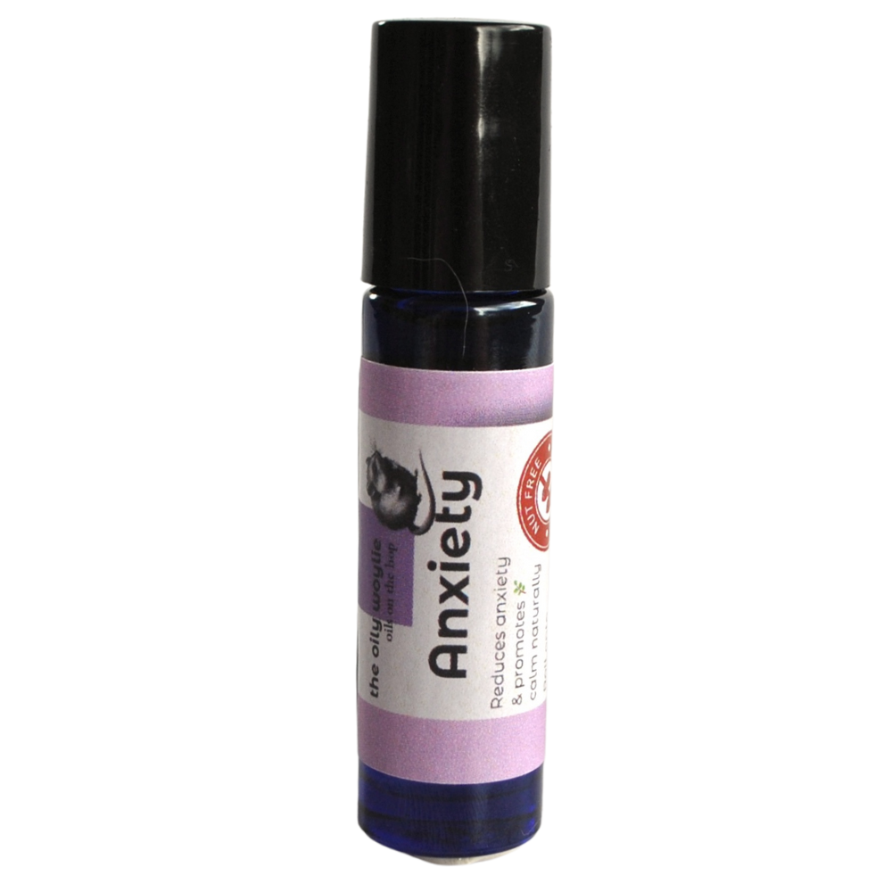 Roll-on bottle labeled 'Anxiety' with a black cap on a white background