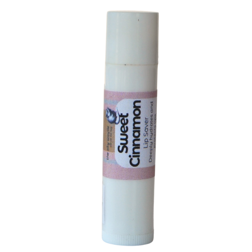 Lip balm tin with sweet cinnamon scent to soften dry lips.