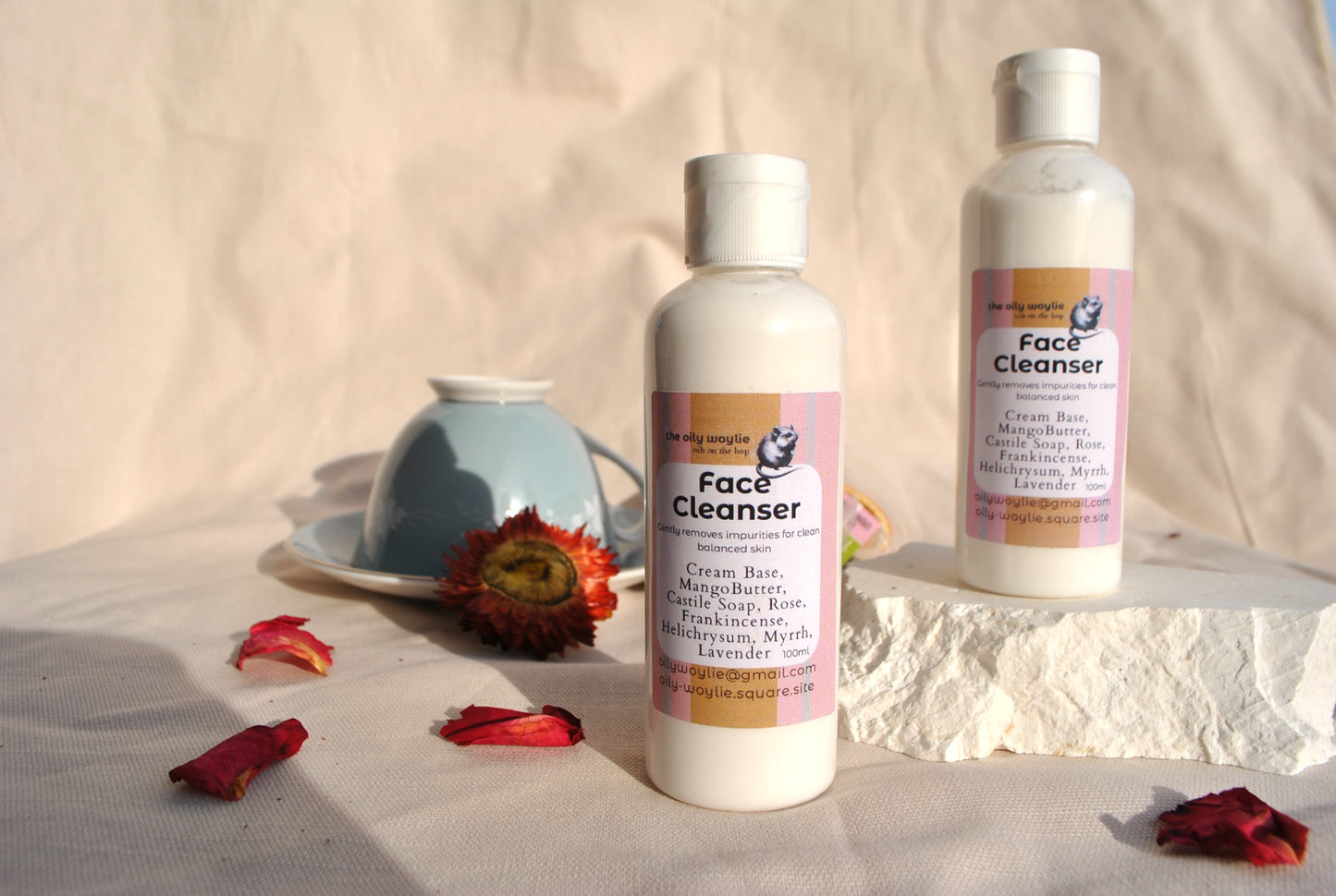 Two bottles of Face Cleanser with floral decorations on a neutral background