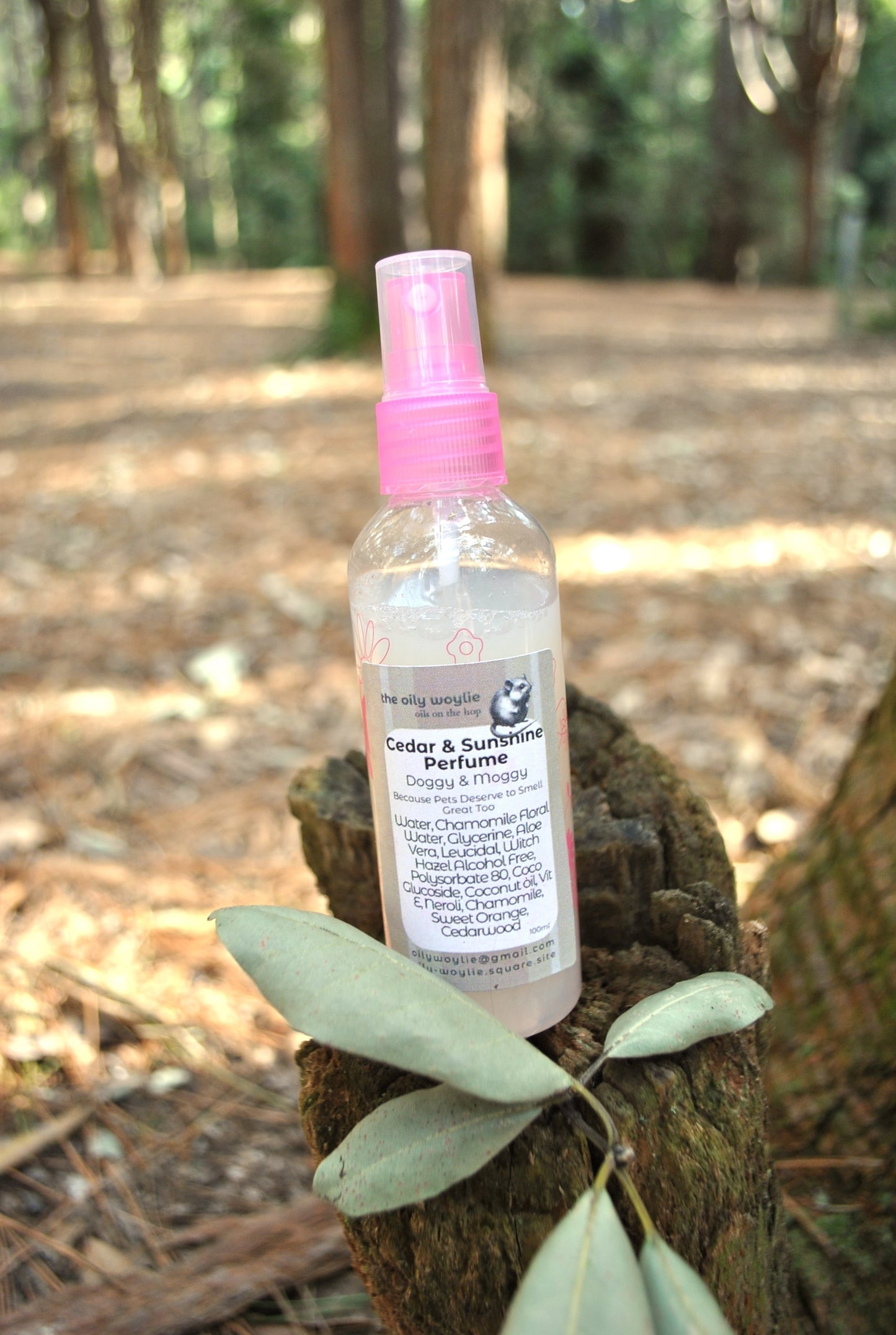 Doggy Perfume Cedar & Sunshine, natural citrus and cedarwood spray to keep dogs smelling fresh on a stump