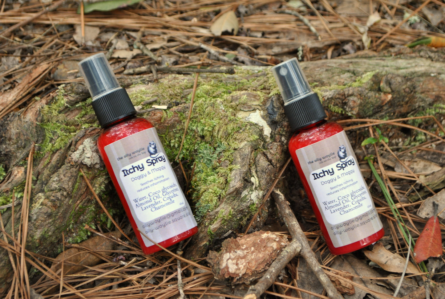 Itchy Spray bottle, natural soothing spray for pets with itchy skin on a natural background with leaves and wood.