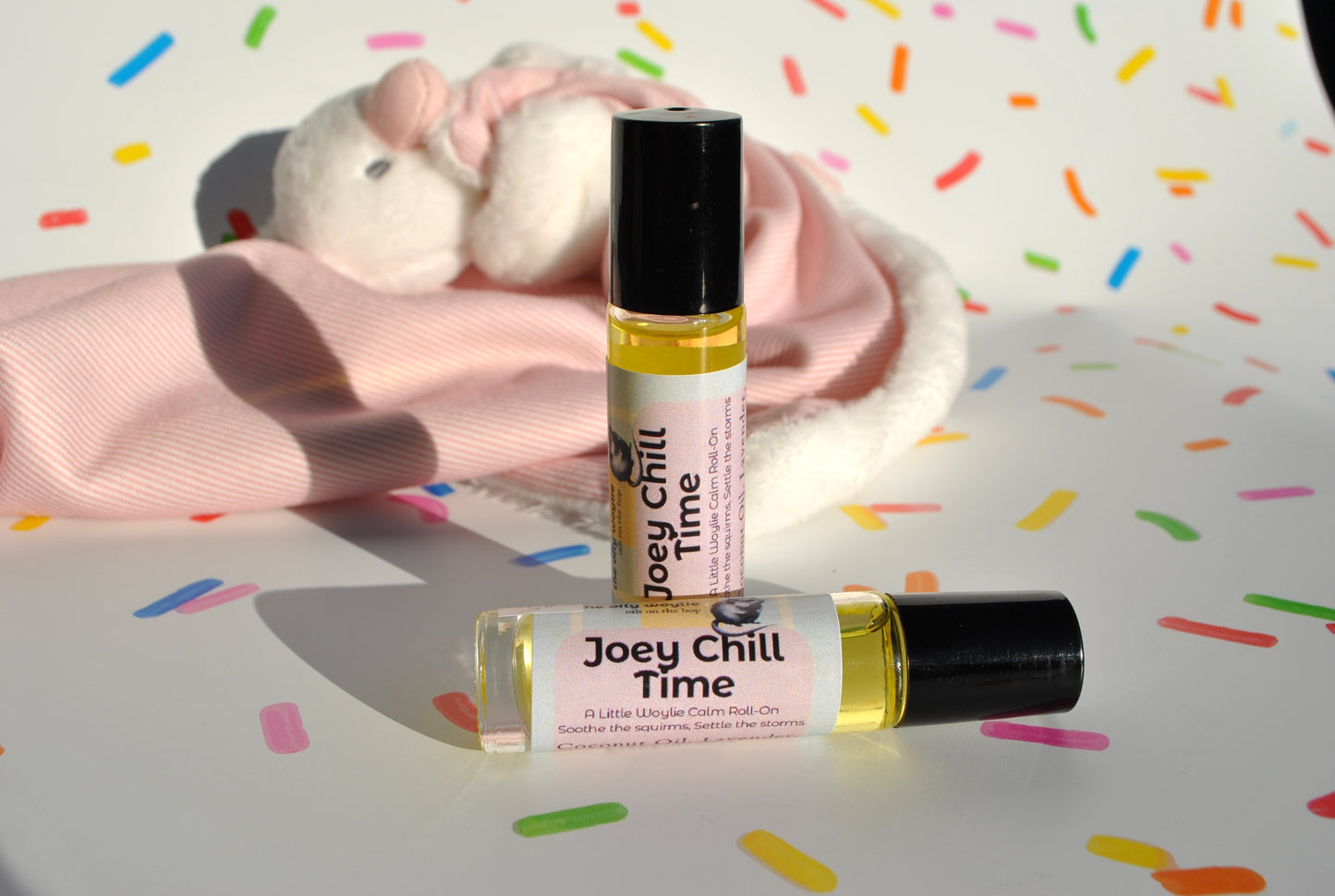 Joey Chill Time essential oil blend for children, calming support in a small roller bottle with plush toy
