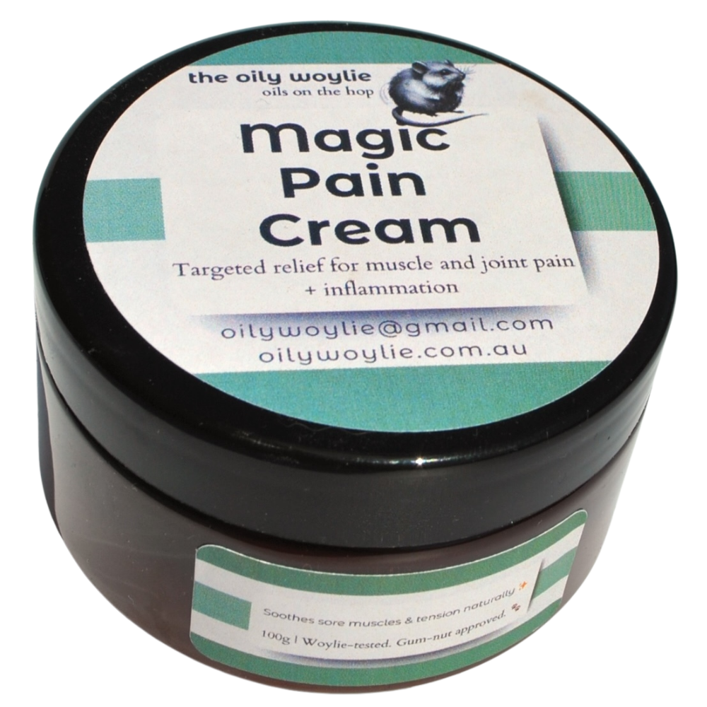 Jar of 'Magic Pain Cream' by the oily woylie on a white background