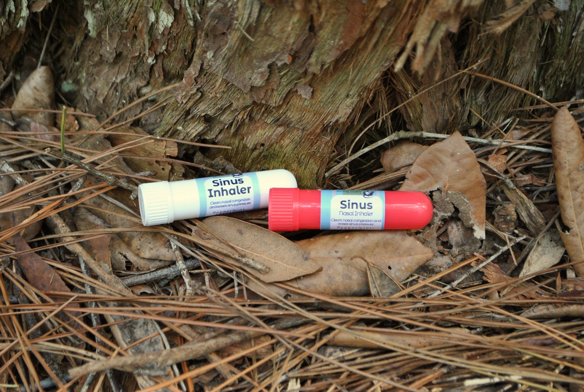Sinus Inhaler tube, natural essential oil inhaler for sinus relief on dry leaves and twigs