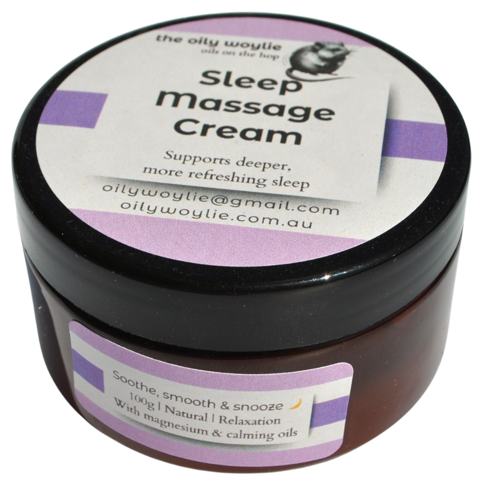 Sleep massage cream jar with black lid and purple labels on a white background
