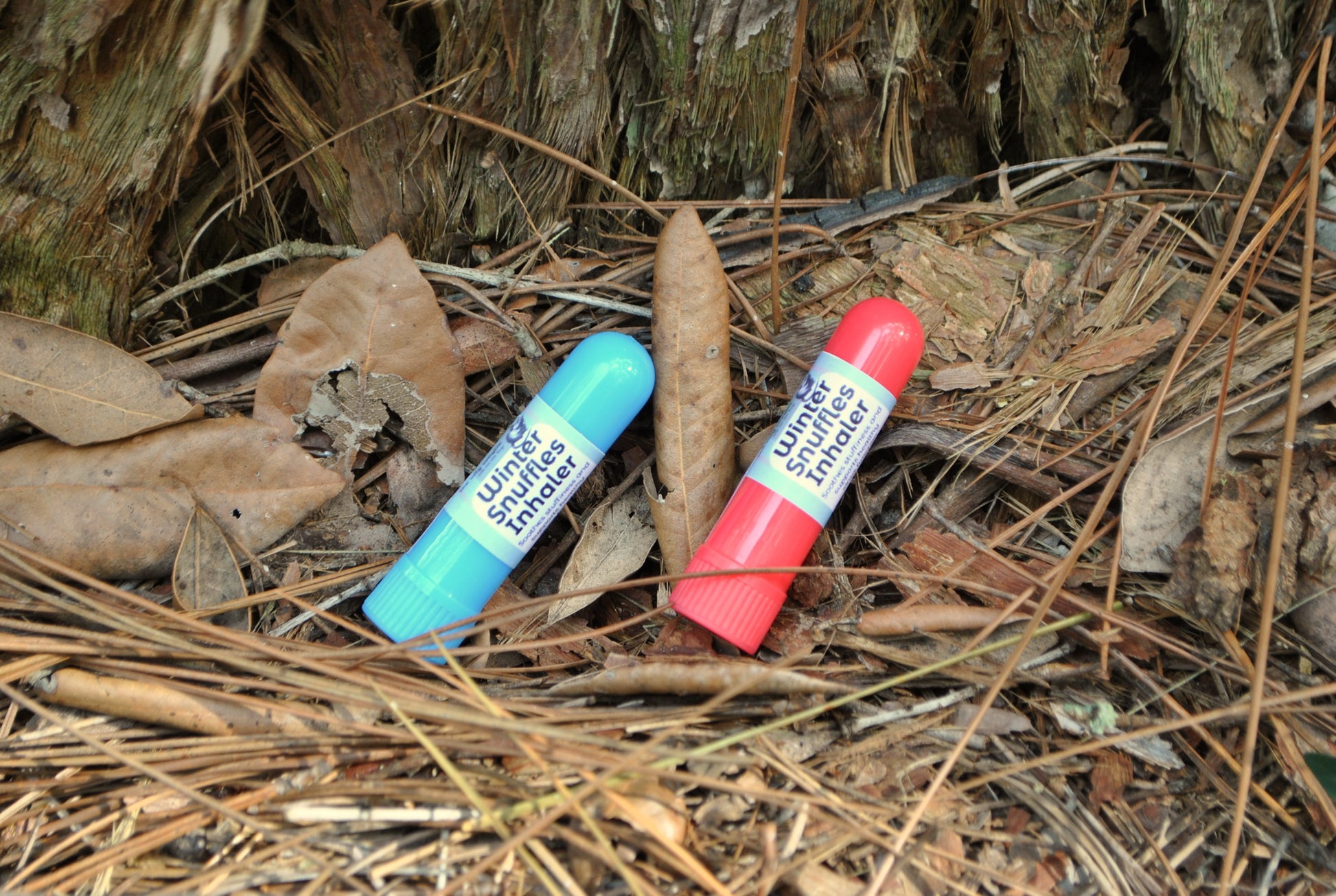 Winter Snuffles Inhaler tube, natural essential oil inhaler for colds and congestion on a bed of leaves and twigs